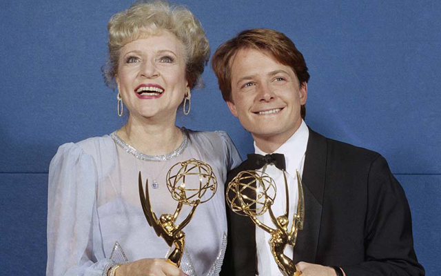 Above: Betty White and Michael J. Fox pose with their Emmy Awards for Outstanding Lead Actress and Actor in a Comedy Series in 1986. White won for her role on the Golden Girls and Fox for his on Family Ties