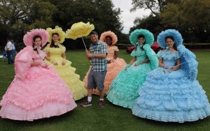 Above: Mike Dojc poses with a gaggle of Azalea Trail Maids. Fifty high school seniors are handpicked each year, an honour more highly sought than prom queen, to serve as official Ambassadors of the city.