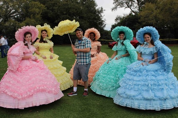 Above: Mike Dojc poses with a gaggle of Azalea Trail Maids. Fifty high school seniors are handpicked each year, an honour more highly sought than prom queen, to serve as official Ambassadors of the city.