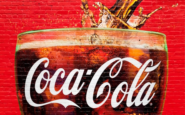 Above: A glass full of Coca Cola painted in a old wall in Atlanta, Georgia. Atlanta is the home of Coca Cola. (Photo: Luciano Mortula/Shutterstock)