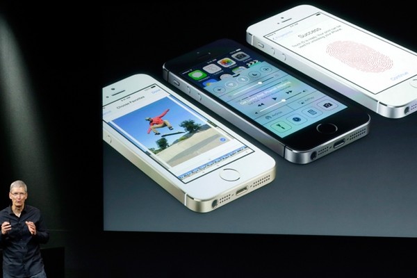 Tim Cook, CEO of Apple, introduces the iPhone 5s (Photo: Marcio Jose Sanchez/Associated Press)