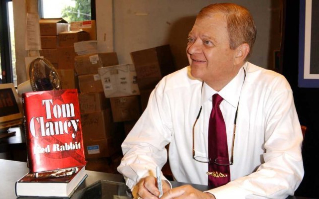 Above: Tom Clancy at a 2002 book signing for his bestselling novel, Red Rabbit