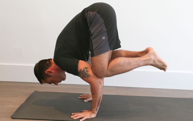 Learn how to do a 'Crane Pose' (Photo credits: Glenn Gebhardt)