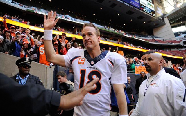 Above: The Broncos' Peyton Manning after he set an NFL record with his 51st touchdown pass