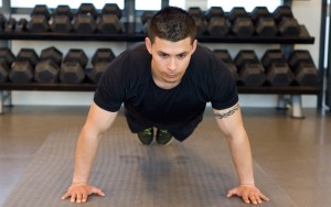 Learn how to perform a Wide Push-Up (Photos by: Timothy Flynn - Dearhunter Photography)