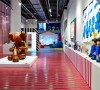 Above: This Is Not a Toy at Canada's Design Exchange features Better Knowing, a 60" wood sculpture by New York artist KAWS