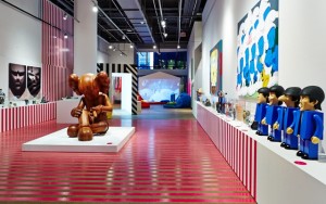 Above: This Is Not a Toy at Canada's Design Exchange features Better Knowing, a 60" wood sculpture by New York artist KAWS