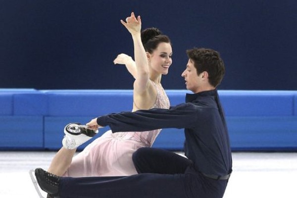 Above: Tessa Virtue and Scott Moir win silver for ice dance at Sochi on Monday
