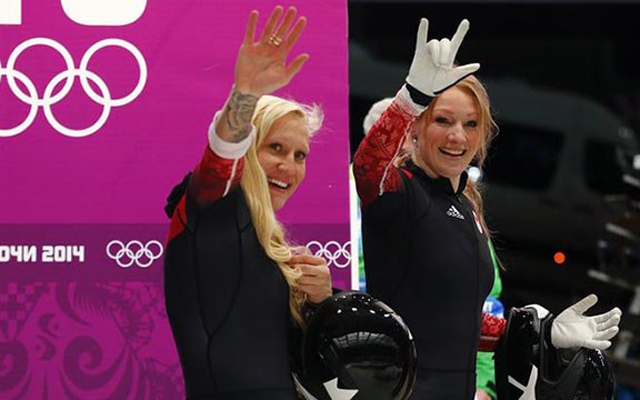 Canadians Kaillie Humphries and Heather Moyse made Olympic history by becoming the first women bobsledders to repeat as Olympic champions on Wednesday