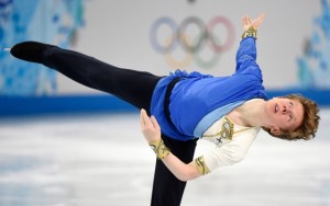 Above: Canada's Kevin Reynolds snagged a silver medal after performing his free program in the men's portion of the figure skating team competition on Day 2 of Sochi