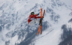 Canada's Dara Howell takes a jump during the women's freestyle skiing slopestyle at the 2014 Winter Olympics