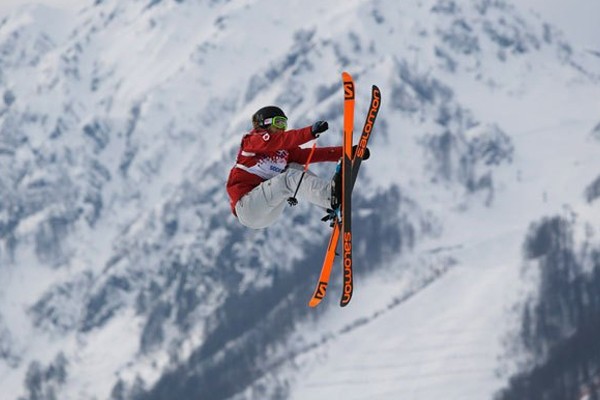 Canada's Dara Howell takes a jump during the women's freestyle skiing slopestyle at the 2014 Winter Olympics