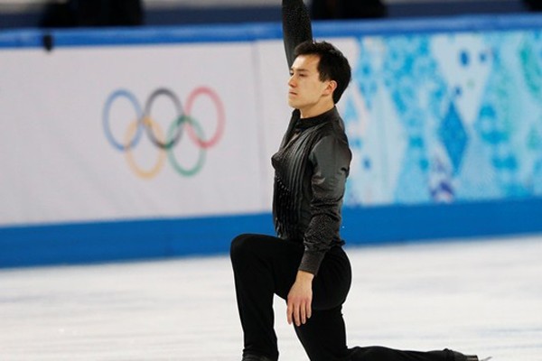 Above: Patrick Chan took the silver medal in men's figure skating behind his Japanese rival, 19-year-old phenom Yuzuru Hanyu