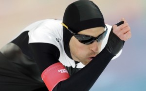 Above: Canada's Denny Morrison wins bronze in the men's 1,500-meter speedskating