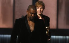 Above: Kanye West stole the spotlight at the Grammys once again by rushing to the stage when Beck won the Album of the Year award for his 'Morning Phases'