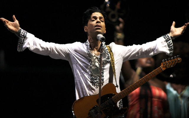 Above: Prince performs during the Coachella Valley Music And Arts Festival on April 26, 2008