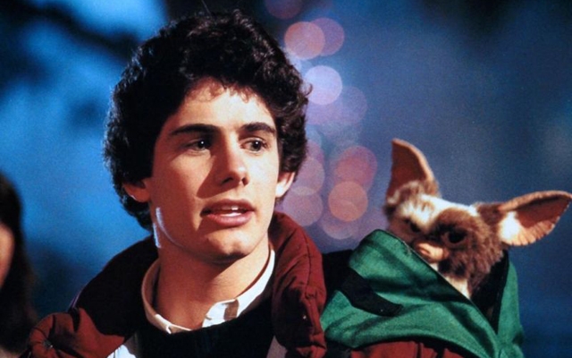 Above: Billy Peltzer (played by Zach Galligan) and Gizmo in the original 'Gremlins' film