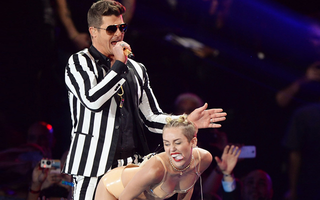 The 10 Most Memorable MTV VMA Moments In History - Miley Cyrus and Robin Thicke