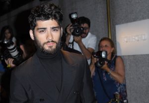 Above: The singer will release a his Versace capsule line next year