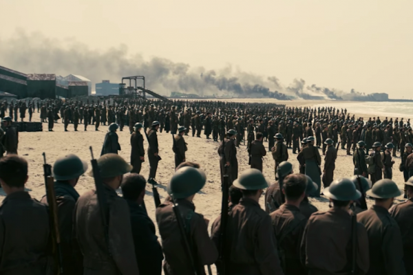 Above: Allied soldiers line the beach in 'Dunkirk'