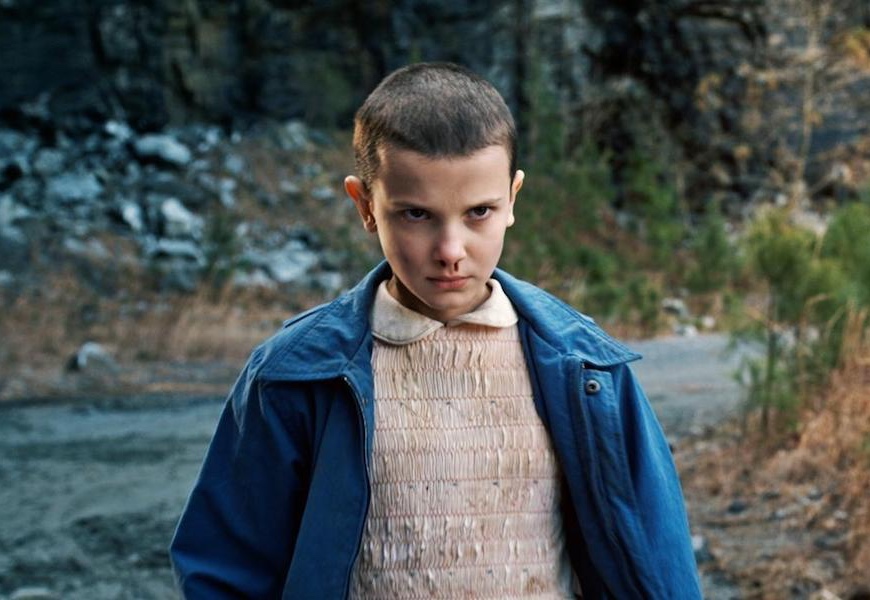Above: Millie Bobby Brown is Eleven in 'Stranger Things'