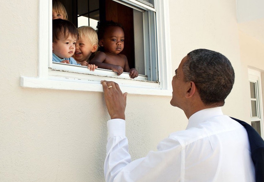 Above: Obama greets four children in Bethesda, Md (2011)