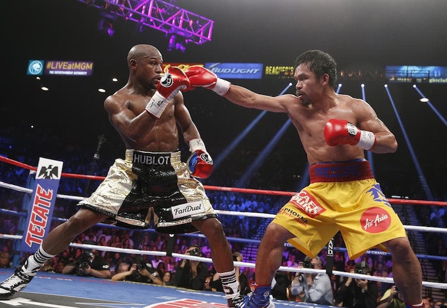 Above: Mayweather and Pacquiao duke it out at the Grand Garden Arena in Las Vegas, NV (May 2, 2015)