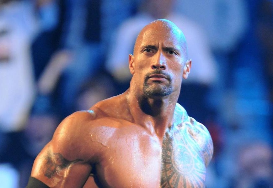 Above: Dwayne "The Rock" Johnson poses in the wrestling ring