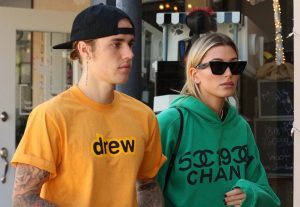 Above: Justin Bieber rocks a drew shirt beside Hailey Baldwin