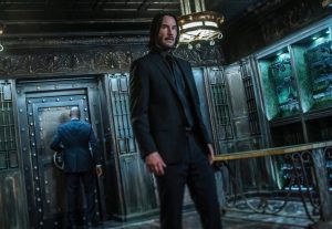 Above: Keanu Reeves broods as John Wick